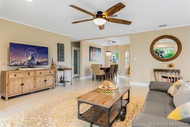 Living room view showing spatial relation to dinin