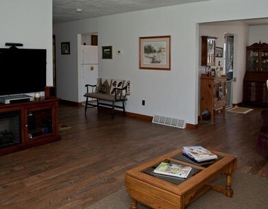 Living Room. Ample sized living room with rustic w
