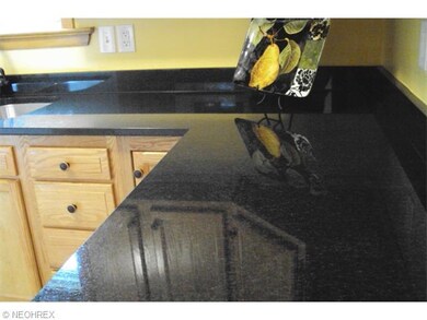 Granite throughout the kitchen.