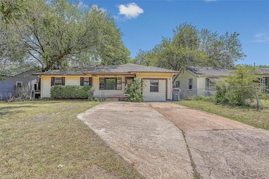 Ranch-style house featuring driveway and roof with shingles