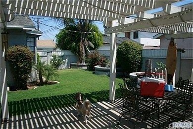 Covered Patio & Back Yard