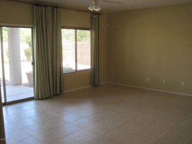 Great room has wall of windows