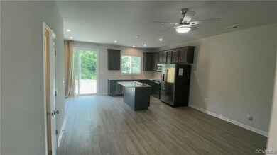 Kitchen with light hardwood / wood-style flooring,