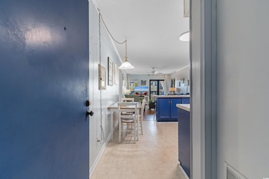Entrance foyer featuring visible vents, light floo