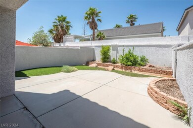 Private Yard with Covered Patio and Desert Landsca