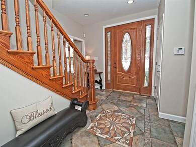 Such a gracious entry with solid wood custom made 