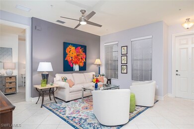 Tiled living room with ceiling fan