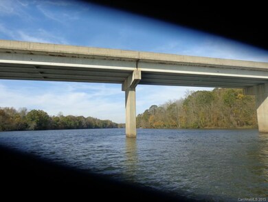 The water is 15 feet deep in the center from Duke State Park all the way to River Oaks Landings. The depth finder said the sides of the shore were consistently at 6 feet deep. This land is gorgeous. Easy to build on. Looking for the developer that can envision this to be a thriving fabulous opportunity.