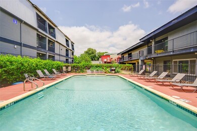 Community pool featuring a patio area