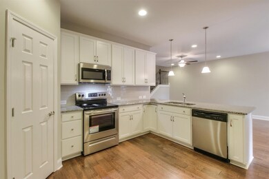Open kitchen with large pantry! *Home under construction. Photos of another Waverleigh with similar finishes for representation only.