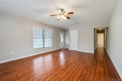 Check out those beautiful wood floors in the livin