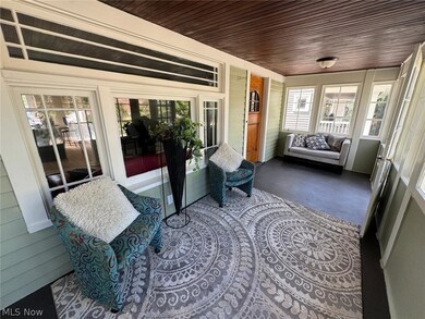 Sunroom / solarium featuring wooden ceiling
