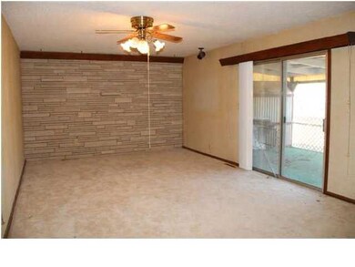 Spacious living room with sliding door to the cove