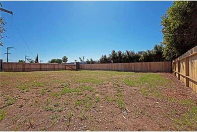 Newly fenced in area in front of the lot, possible