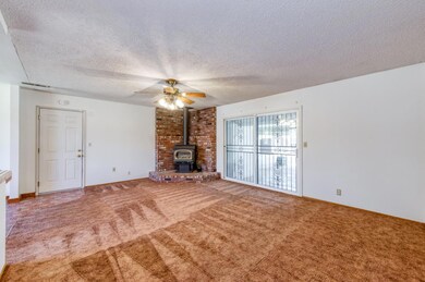 Spacious living room with access to the garage.