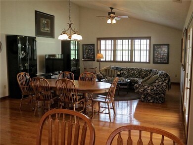 Great Room. Soaring vaulted ceilings & hardwood fl