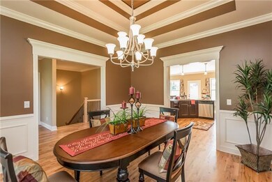 Hardwoods in Foyer, Dining Room, Living Room, & Kitchen.