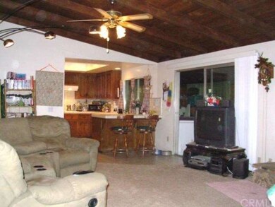 Den w/ wood beamed ceilings!