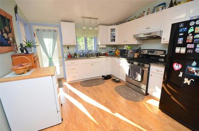 Sun filled kitchen with granite...