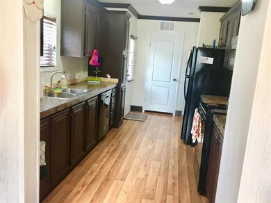 Kitchen with new flooring and appliances