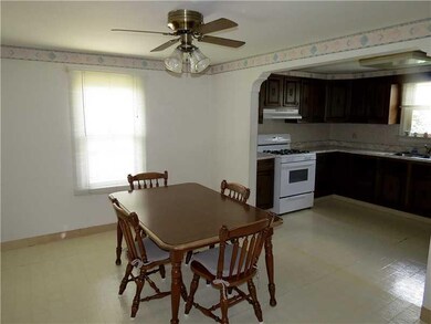 Dining Room. The 13X9 dining room is open to the k