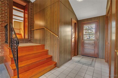 Breezeway has tile flooring, nice size coat closet