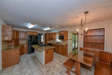 Updated eat in kitchen kitchen with an abundance o