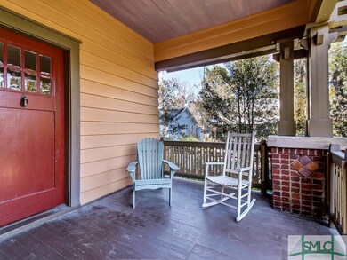 Deep front porch.  Great space for people watching