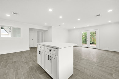 Spacious and bright open-concept living area with