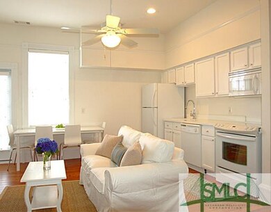 Living Room. 9 ft plus ceilings, heart pine floors