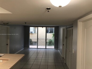 Dining, living room and balcony