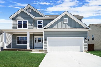 Full Porch and Concrete Driveway