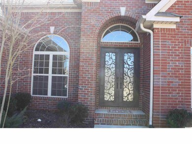 Arched Doorway with Steel Double Doors
