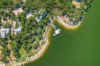 Aerial view of property's location featuring a nearby body of water