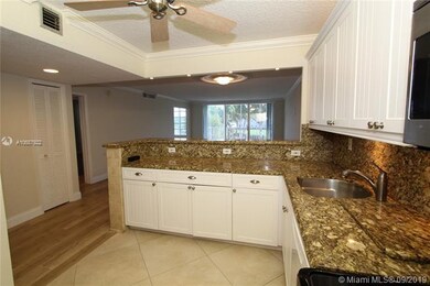 KITCHEN OPEN TO DINING/LIVING ROOM