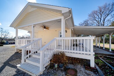 Spacious  large covered deck with ceiling fans for enjoyable summer evenings.