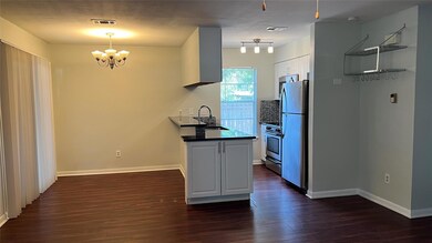Kitchen featuring a sink, appliances with stainle