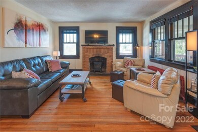 Warm living room to the right of the front door