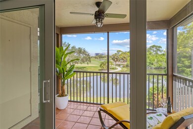 Lanai Entry with Stunning Water Views. Step out onto your private screened balcony—ideal for sipping morning coffee or evening wine with a view.