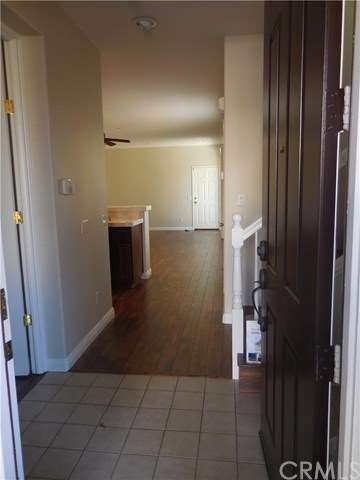 view from foyer, new fresh paint, new flooring, we
