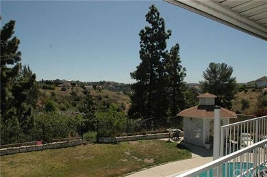 Rear view overlooking surrounding valley, hills an