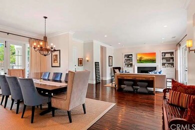 Formal living and dining rooms flow seamlessly for