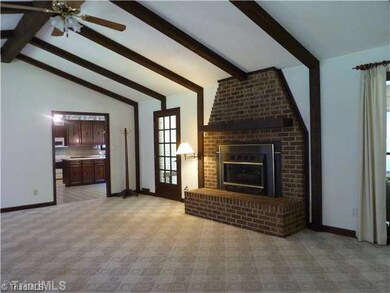 Den/Family/Great Room. Cathedral ceilings and wooden beams in the Great Room overlooking the courtyard area.
