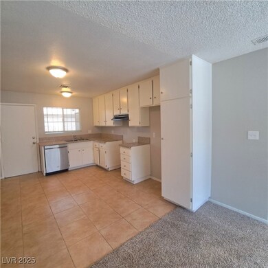Kitchen featuring stainless steel dishwasher, visi
