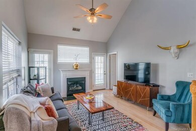 Kitchen/Dining space opens to a two story great ro