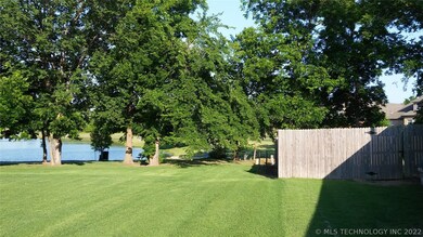 Walk out your side gate (on right of photo) and yo