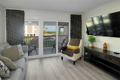 The living space is bright and airy with Gulf view