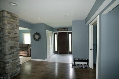 The front door and foyer area, terrific color + styling