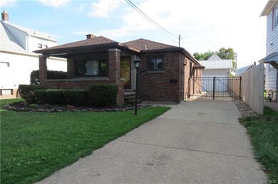 Concrete driveway with gated entrance to your 3 pl