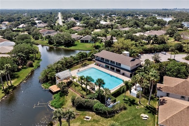 Aerial view of a nearby Clubouse and pool area.